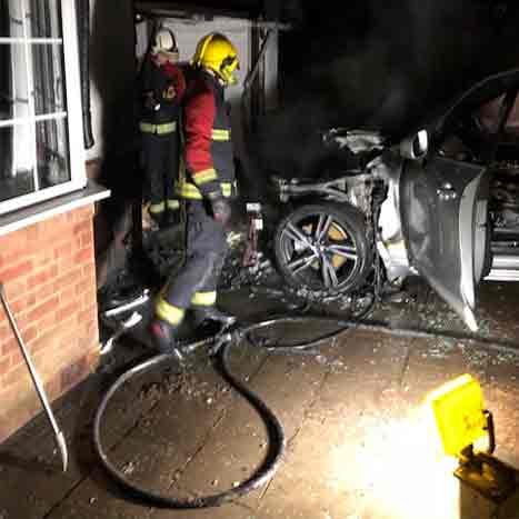 Firemen-dousing-the-fire-caused-by-a-lithium-battery.jpg